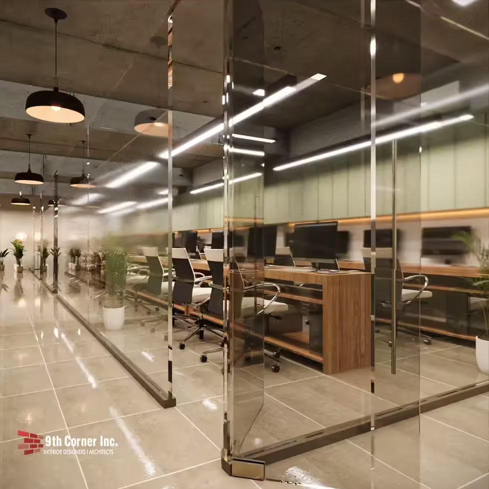 Glass-partitioned IT and billing workstations in a corporate office by 9th Corner