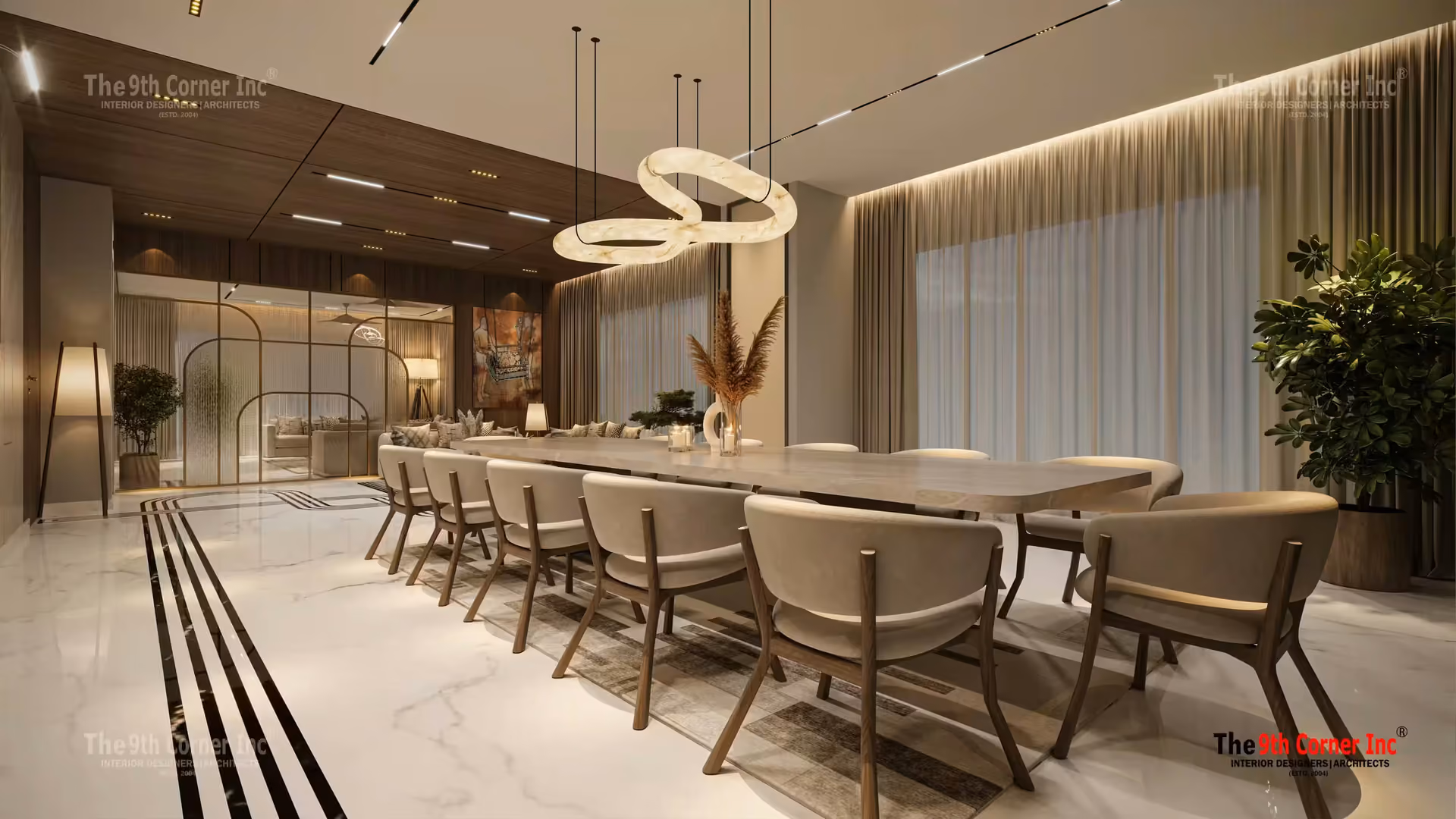 Dining room with twelve-seater table and ring chandelier at Mr Rana residence in Noida by Ninth Corner