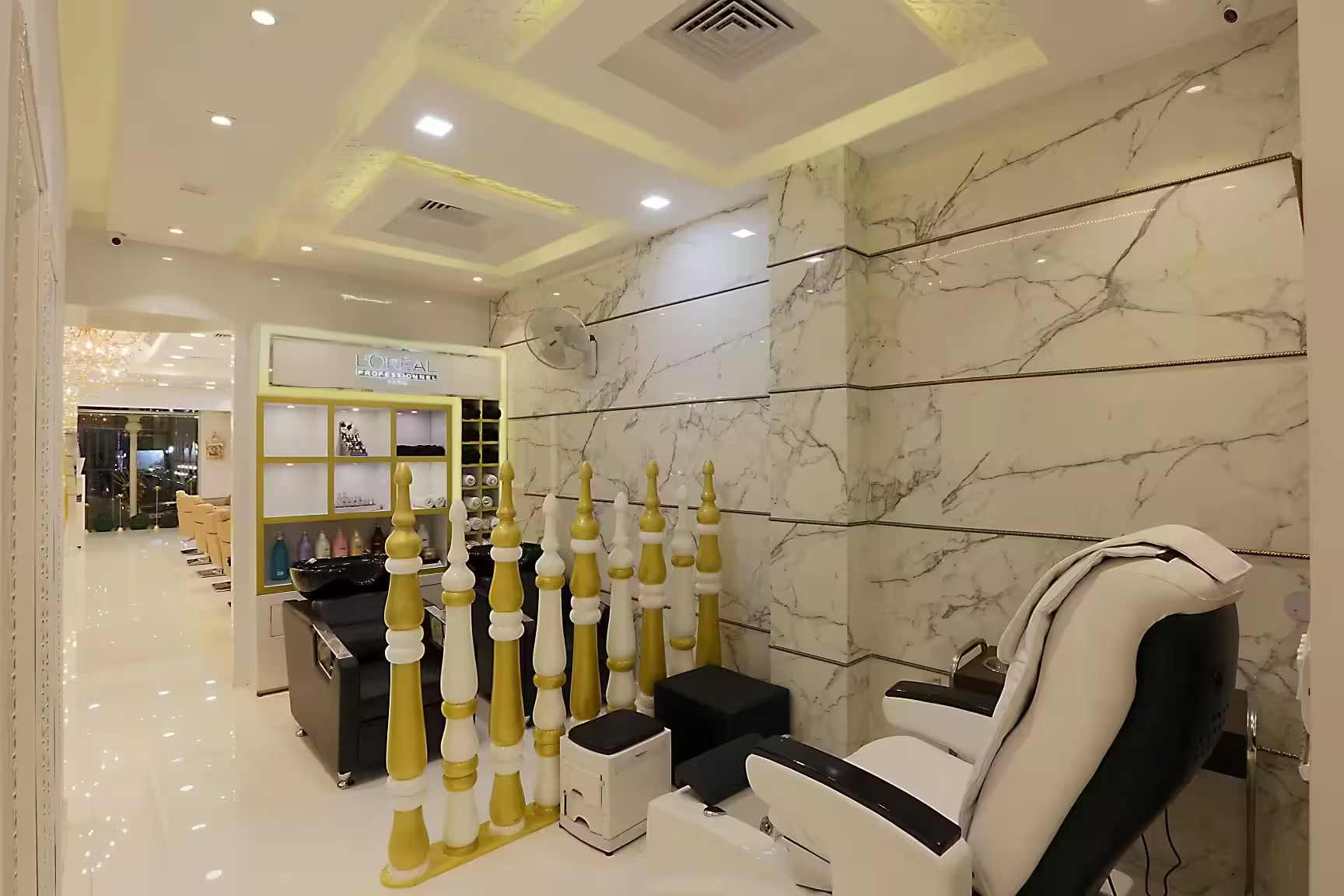 Product display shelving and seating in a retail area designed by 9th Corner